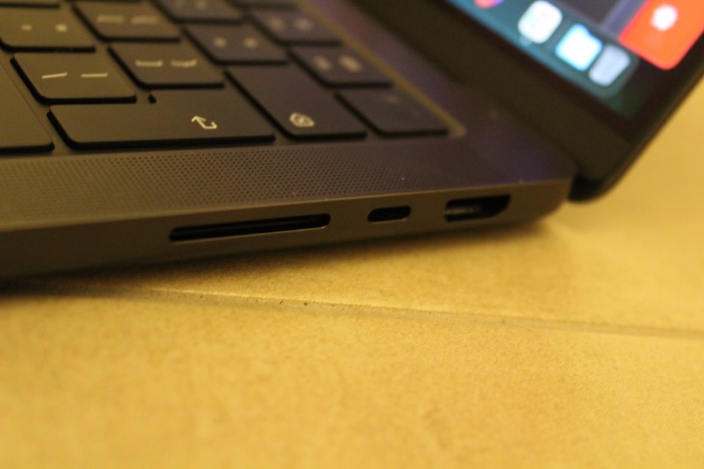 The right side of the MacBook Pro has an HDMI 2.1 port, another USB-C connector and an SD card reader